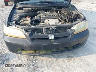 1999 Honda Accord LX z VIN 1HGCG5641XA008694, wystawiony jako IAAI lot #42385438 z przebiegiem 323 971 mil mil oraz . Historia ofert i sprzedaży dostępna na DreamBid. Obrazek 16.
