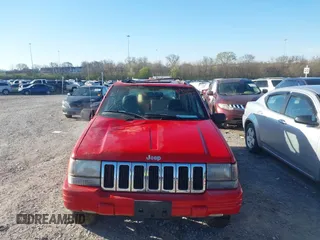 1998 Jeep Grand Cherokee Laredo with VIN 1J4GZ48Y6WC290798, listed as a IAAI auction lot 41816161 with 299,875 mi miles. Bid and sale history available at carsss.com. Image 12.