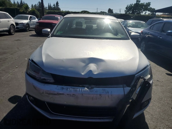 2012 Volkswagen Jetta SEL with VIN 3VWLP7AJ6CM324271, listed as a Copart auction lot 59986855 with 129,002 mi miles and Salvage title. Bid and sale history available at DreamBid. Image 5.