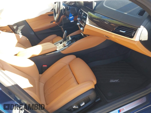 2021 BMW 5 Series 530i xDrive with VIN WBA13BJ02MWW98133, listed as a IAAI auction lot 41853619 with Not Provided miles and . Bid and sale history available at carsss.com. Image 5.