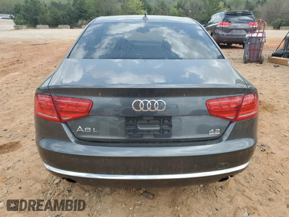 2011 Audi A8 z VIN WAURVAFD9BN013776, wystawiony jako Copart lot #51989675 z przebiegiem 148 822 mil mil oraz Szkody całkowita. Historia ofert i sprzedaży dostępna na DreamBid. Obrazek 6.