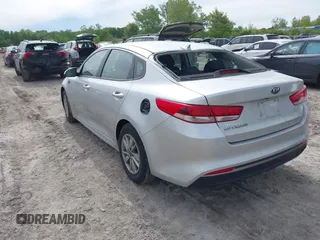 2017 Kia Optima LX with VIN 5XXGT4L39HG177174, listed as a IAAI auction lot 42341531 with 94,801 mi miles and . Bid and sale history available at DreamBid. Image 3.
