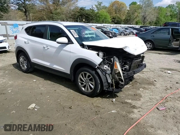 2016 Hyundai Tucson SE z VIN KM8J33A43GU179941, wystawiony jako Copart lot #54006625 z przebiegiem 132 122 mil mil oraz Szkoda całkowita • Salvage title. Historia ofert i sprzedaży dostępna na DreamBid. Obrazek 14.