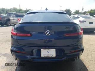 2020 BMW X4 M Competition z VIN 5YMUJ0C08L9C42121, wystawiony jako Copart lot #52499963 z przebiegiem 20 984 mil mil oraz . Historia ofert i sprzedaży dostępna na DreamBid. Obrazek 6.