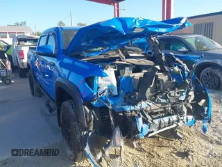 2019 Toyota Tacoma SR with VIN 5TFCZ5AN9KX197898, listed as a IAAI auction lot 41304019 with 111,995 mi miles and . Bid and sale history available at DreamBid. Image 1.