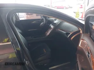 2014 Lincoln MKZ with VIN 3LN6L2J90ER812203, listed as a IAAI auction lot 42078804 with 139,238 mi miles. Bid and sale history available at carsss.com. Image 5.