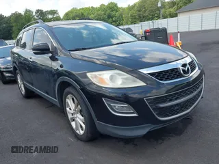 2012 Mazda CX-9 Grand Touring z VIN JM3TB2DA8C0368685, wystawiony jako IAAI lot #42305362 z przebiegiem 212 720 mil mil oraz . Historia ofert i sprzedaży dostępna na DreamBid. Obrazek 1.
