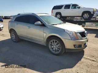 2015 Cadillac SRX Premium Collection with VIN 3GYFNDE32FS536692, listed as a Copart auction lot 54669175 with 80,484 mi miles and Salvage title. Bid and sale history available at DreamBid. Image 4.