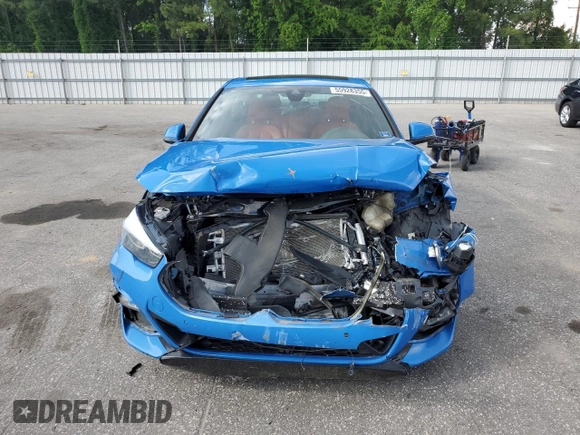 2021 BMW 2 Series 228i with VIN WBA53AK00M7J43699, listed as a Copart auction lot 55928355 with 86,544 mi miles and Salvage title. Bid and sale history available at DreamBid. Image 5.