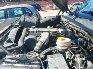 1998 Dodge 2500 z VIN 1B7KF236XWJ242400, wystawiony jako IAAI lot #42733917 z przebiegiem 289 749 mil mil oraz . Historia ofert i sprzedaży dostępna na DreamBid. Obrazek 19.