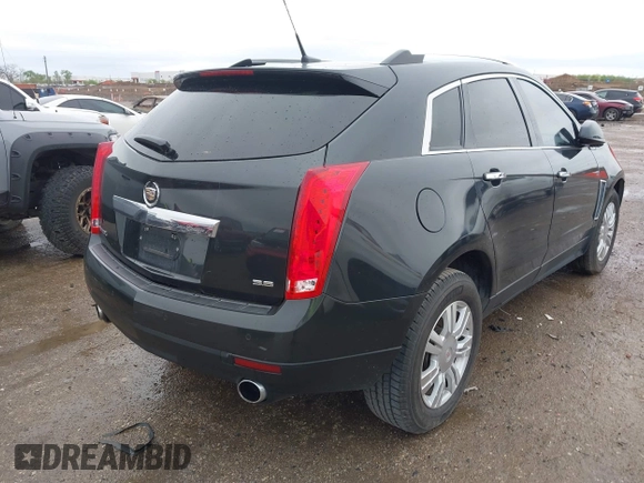 2014 Cadillac SRX Luxury Collection with VIN 3GYFNBE31ES591962, listed as a IAAI auction lot 41948735 with 97,523 mi miles and . Bid and sale history available at carsss.com. Image 4.