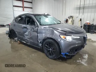2019 Alfa Romeo Stelvio z VIN ZASPAKAN2K7C32117, wystawiony jako Copart lot #41795675 z przebiegiem 90 124 mil mil oraz Szkoda całkowita • Salvage title. Historia ofert i sprzedaży dostępna na DreamBid. Obrazek 4.
