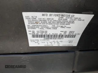 2018 Ford Taurus SHO с VIN 1FAHP2KTXJG134014, выставлен на аукционе IAAI как лот 41785008 с пробегом 124 109 миль миль и . История ставок и продаж доступна на DreamBid. Изображение 9.