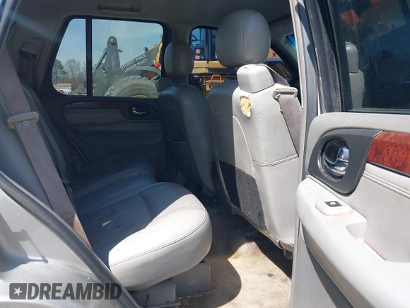 2005 GMC Envoy SLE with VIN 1GKDS13S652390259, listed as a IAAI auction lot 41825258 with 162,172 mi miles and . Bid and sale history available at DreamBid. Image 8.