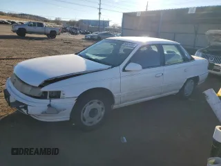1995 Mercury Sable GS with VIN 1MELM50UXSG617772, listed as a Copart auction lot 86834064 with 120,994 mi miles and Salvage Title. Bid and sale history available at carsss.com. Image 1.
