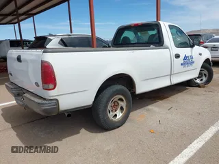 2003 Ford F-150 XL with VIN 1FTRF17203NB52533, listed as a IAAI auction lot 41862321 with 114,775 mi miles and . Bid and sale history available at DreamBid. Image 4.