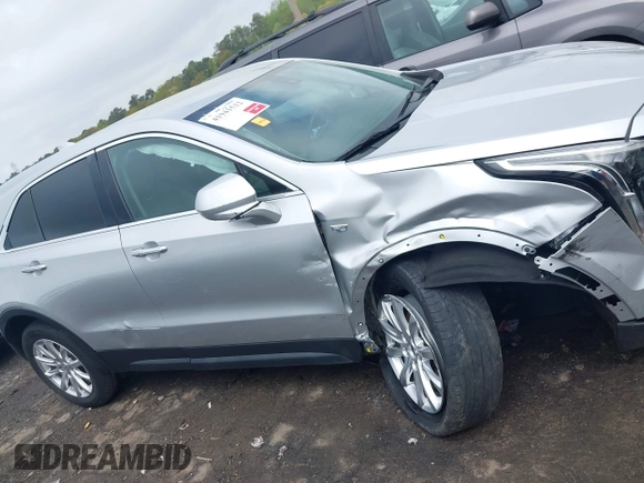 2019 Cadillac XT4 FWD Luxury z VIN 1GYAZAR43KF160132, wystawiony jako IAAI lot #41941512 z przebiegiem 68 835 mil mil oraz . Historia ofert i sprzedaży dostępna na DreamBid. Obrazek 13.
