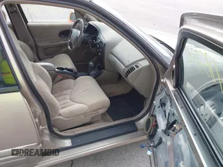1997 Oldsmobile Cutlass Supreme S z VIN 1G3WH52M4VF303898, wystawiony jako IAAI lot #41853372 z przebiegiem 125 239 mil mil oraz . Historia ofert i sprzedaży dostępna na DreamBid. Obrazek 5.