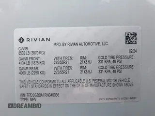 2024 Rivian R1S Adventure with VIN 7PDSGBBA1RN040036, listed as a IAAI auction lot 41694635 with 13,855 mi miles. Bid and sale history available at carsss.com. Image 9.