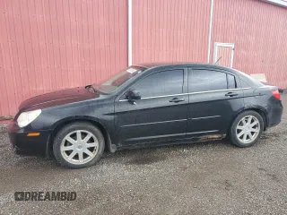 2009 Chrysler Sebring Touring z VIN 1C3LC56D69N570746, wystawiony jako Copart lot #55300405 z przebiegiem 186 391 mil mil oraz Czysty tytuł • Clean title. Historia ofert i sprzedaży dostępna na DreamBid. Obrazek 1.
