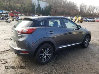 2016 Mazda CX-3 Grand Touring z VIN JM1DKBD75G0109742, wystawiony jako Copart lot #70424582 z przebiegiem 62 225 mil mil oraz . Historia ofert i sprzedaży dostępna na DreamBid. Obrazek 3.
