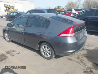 2010 Honda Insight EX with VIN JHMZE2H71AS032532, listed as a IAAI auction lot 41988221 with 333,144 mi miles and . Bid and sale history available at DreamBid. Image 3.