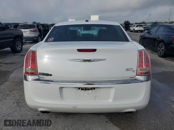 2013 Chrysler 300 C z VIN 2C3CCAET9DH713384, wystawiony jako Copart lot #53731205 z przebiegiem 116 593 mil mil oraz Szkoda całkowita • Salvage title. Historia ofert i sprzedaży dostępna na DreamBid. Obrazek 6.