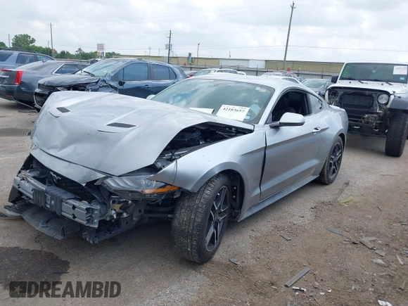 2020 Ford Mustang EcoBoost z VIN 1FA6P8TH2L5186210, wystawiony jako IAAI lot #42103657 z przebiegiem 68 790 mil mil oraz . Historia ofert i sprzedaży dostępna na DreamBid. Obrazek 18.