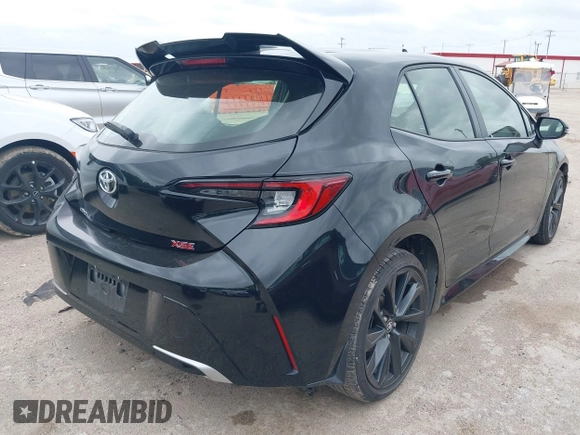 2024 Toyota Corolla Hatchback XSE with VIN JTNC4MBE4R3229869, listed as a IAAI auction lot 42128977 with 15,358 mi miles. Bid and sale history available at carsss.com. Image 4.