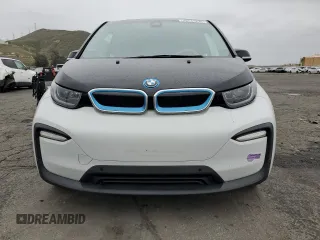 2019 BMW i3 with VIN WBY8P4C54K7D09611, listed as a Copart auction lot 48233235 with 59,853 mi miles and Salvage Title. Bid and sale history available at carsss.com. Image 5.