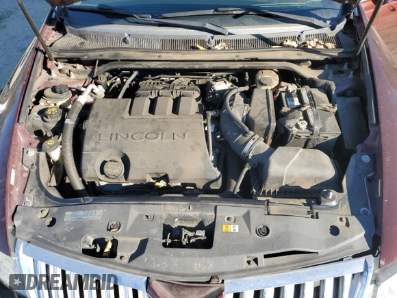 2012 Lincoln MKS with VIN 1LNHL9ER2CG802577, listed as a Copart auction lot 85455164 with 121,169 mi miles and Salvage Title. Bid and sale history available at DreamBid. Image 11.