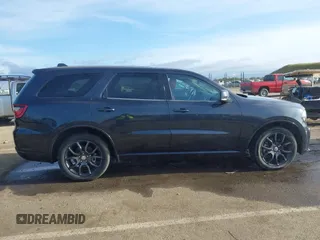 2015 Dodge Durango R/T with VIN 1C4SDJCT1FC188401, listed as a IAAI auction lot 42124652 with 86,339 mi miles and . Bid and sale history available at carsss.com. Image 13.