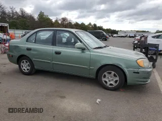 2003 Hyundai Accent GL with VIN KMHCG45CX3U497134, listed as a Copart auction lot 70932594 with 107,980 mi miles and Clean Title. Bid and sale history available at carsss.com. Image 4.