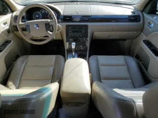 2005 Mercury Montego Premier with VIN 1MEHM42165G617341, listed as a Copart auction lot 88297195 with 82,384 mi miles and Salvage Title. Bid and sale history available at carsss.com. Image 8.