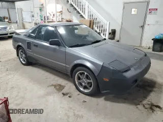 1989 Toyota MR2 z VIN JT2AW15C1K0150268, wystawiony jako Copart lot #86257134 z przebiegiem 93 969 mil mil oraz Tytuł czysty. Historia ofert i sprzedaży dostępna na DreamBid. Obrazek 4.