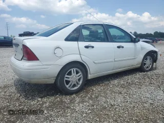 2003 Ford Focus SE with VIN 1FAFP34353W231334, listed as a Copart auction lot 63844205 with 86,601 mi miles and Salvage title. Bid and sale history available at DreamBid. Image 3.