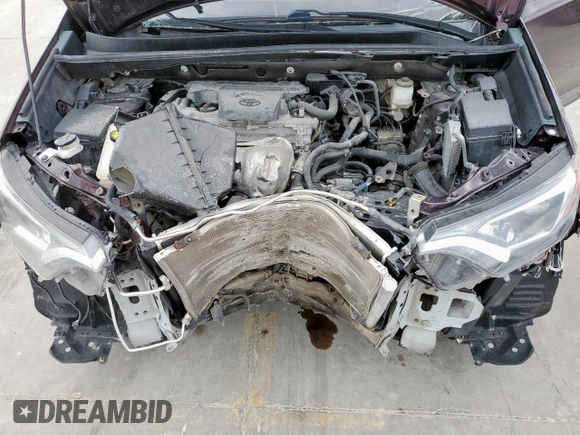 2018 Toyota RAV4 LE with VIN 2T3BFREV0JW713641, listed as a Copart auction lot 55113905 with 58,617 mi miles and Salvage Title. Bid and sale history available at carsss.com. Image 12.