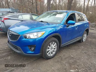 2013 Mazda CX-5 Touring with VIN JM3KE4CE0D0160711, listed as a IAAI auction lot 41843658 with 65,391 mi miles. Bid and sale history available at carsss.com. Image 2.