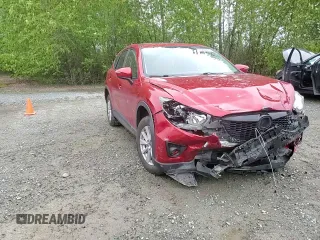 2015 Mazda CX-5 Touring with VIN JM3KE4CY2F0532871, listed as a Copart auction lot 55244375 with Not Provided miles and Salvage Title. Bid and sale history available at carsss.com. Image 14.