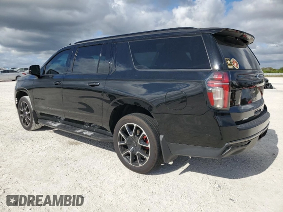 2022 Chevrolet Suburban with VIN 1GNSCEKT7NR222257, listed as a Copart auction lot 84840904 with 113,761 mi miles and Salvage title. Bid and sale history available at DreamBid. Image 2.