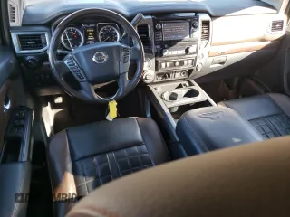 2017 Nissan Titan SL z VIN 1N6AA1E54HN512447, wystawiony jako Copart lot #85330734 z przebiegiem 119 424 mil mil oraz Czysty tytuł • Clean title. Historia ofert i sprzedaży dostępna na DreamBid. Obrazek 8.