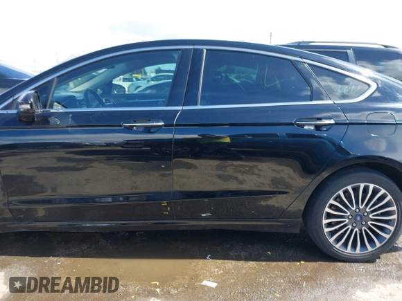 2017 Ford Fusion Titanium with VIN 3FA6P0SU0HR277268, listed as a IAAI auction lot 41798990 with 140,452 mi miles and . Bid and sale history available at DreamBid. Image 15.