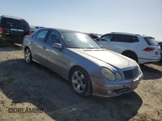 2003 Mercedes-Benz E-Class 5.0L with VIN WDBUF70J43A141846, listed as a Copart auction lot 49706765 with 199,428 mi miles and Salvage Title. Bid and sale history available at carsss.com. Image 4.