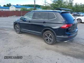 2018 Volkswagen Tiguan SEL z VIN 3VV2B7AXXJM145781, wystawiony jako IAAI lot #42273176 z przebiegiem 86 610 mil mil oraz . Historia ofert i sprzedaży dostępna na DreamBid. Obrazek 3.