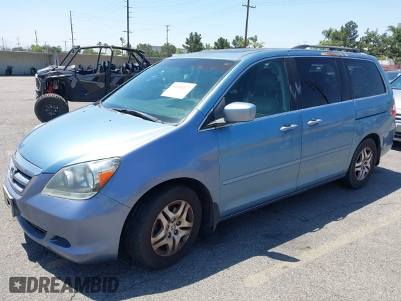 2005 Honda Odyssey EX-L with VIN 5FNRL38785B110823, listed as a IAAI auction lot 42154177 with 195,298 mi miles. Bid and sale history available at carsss.com. Image 2.