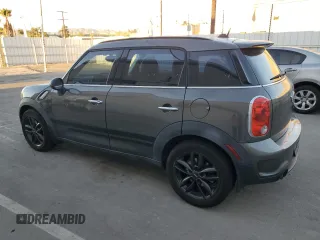 2014 MINI Countryman S with VIN WMWZC3C59EWP29137, listed as a Copart auction lot 79721804 with 124,871 mi miles and Salvage title. Bid and sale history available at DreamBid. Image 2.