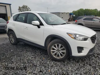 2016 Mazda CX-5 Sport с VIN JM3KE4BY4G0899953, выставлен на аукционе Copart как лот 57269035 с пробегом 196 158 миль миль и Списание • Salvage title. История ставок и продаж доступна на DreamBid. Изображение 4.