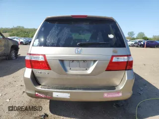 2006 Honda Odyssey EX-L z VIN 5FNRL38726B425098, wystawiony jako Copart lot #56143585 z przebiegiem 153 137 mil mil oraz Szkoda całkowita • Salvage title. Historia ofert i sprzedaży dostępna na DreamBid. Obrazek 6.