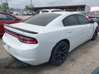 2019 Dodge Charger SXT with VIN 2C3CDXBG6KH670806, listed as a IAAI auction lot 42051415 with 112,144 mi miles and . Bid and sale history available at DreamBid. Image 4.