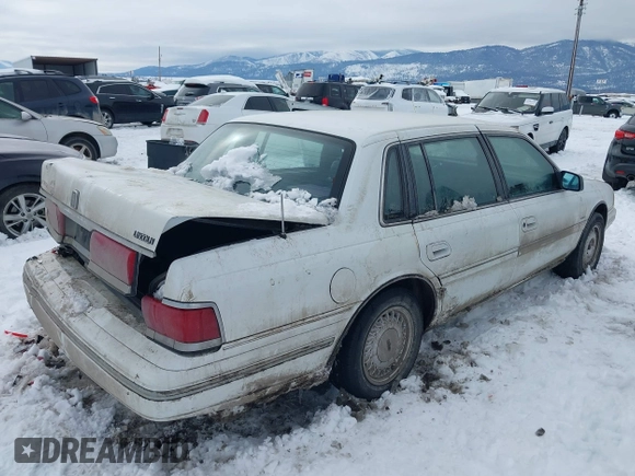 1991 Lincoln Continental with VIN 1LNCM9745MY632946, listed as a IAAI auction lot 41561785 with 124,186 mi miles and . Bid and sale history available at DreamBid. Image 4.